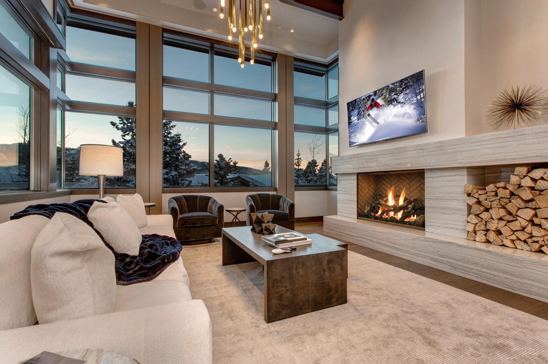 Luxurious, spacious living room at ski in ski out Park City rental with views of Deer Valley Resort - Stein Eriksen Residences